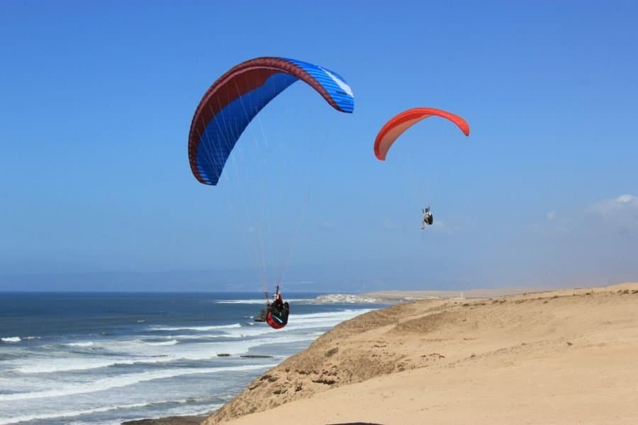 Paragliding above the ocean — Aglou — Aglou Beach